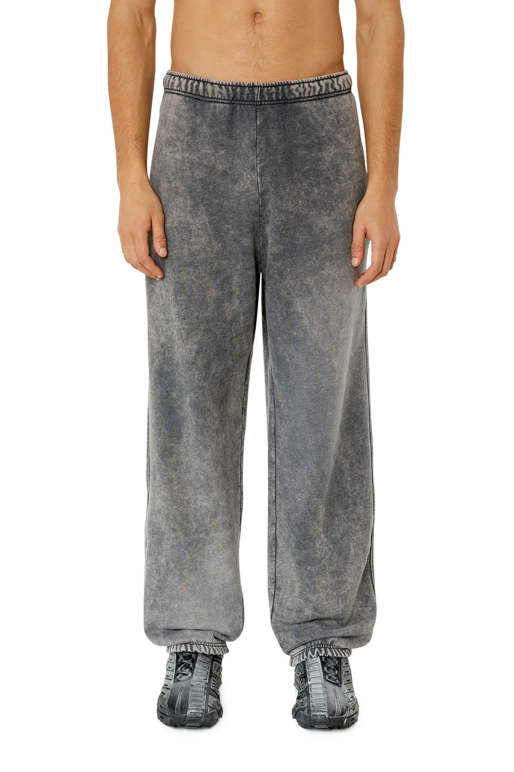 Track pants with whitened treatment