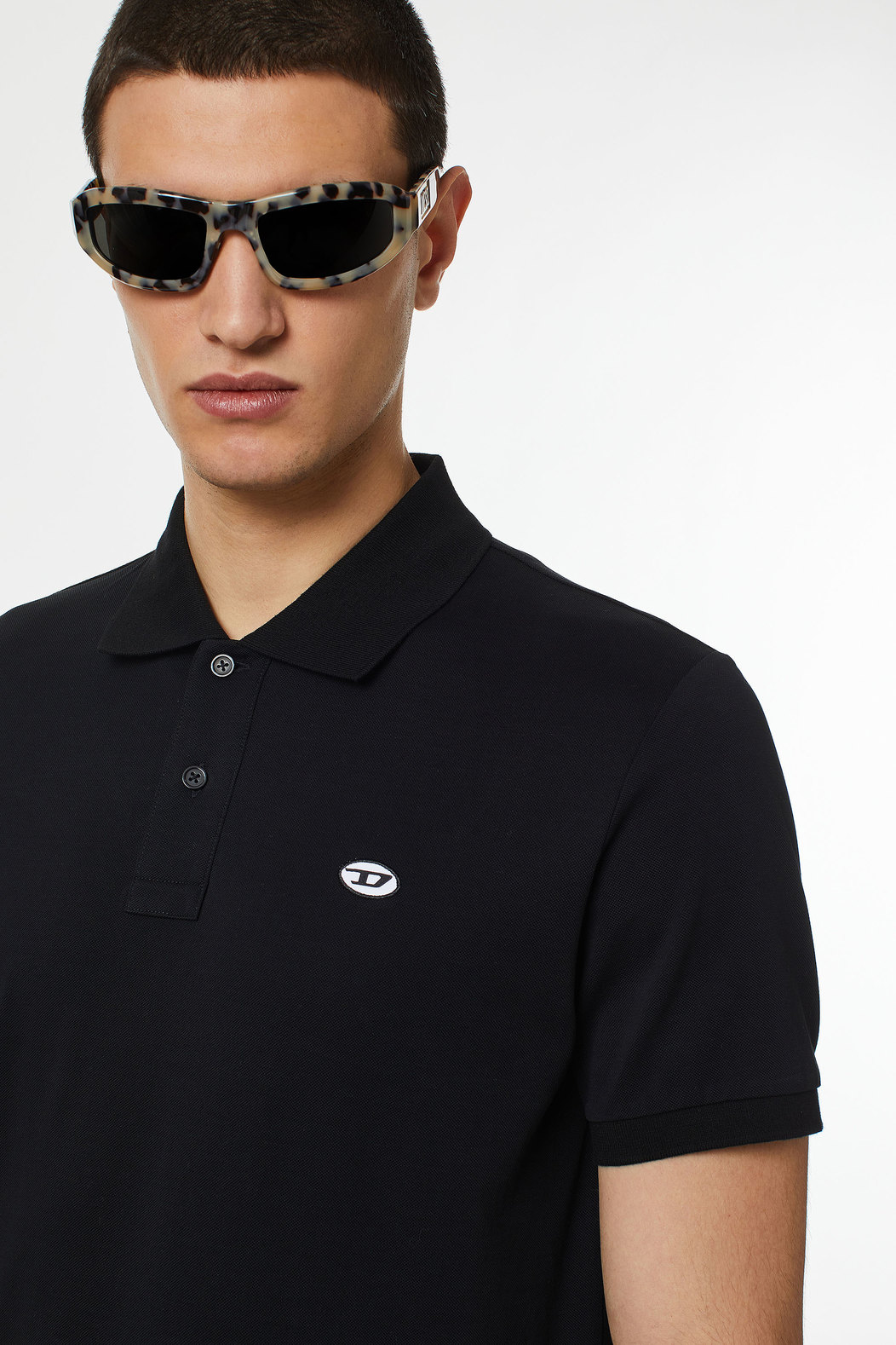 Polo shirt with oval D patch