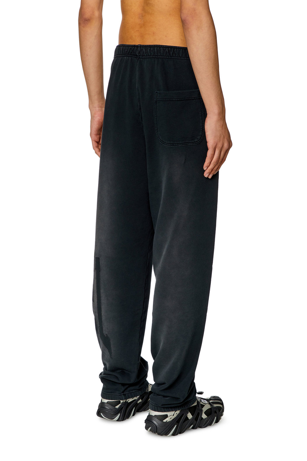 College track pants with LIES patches